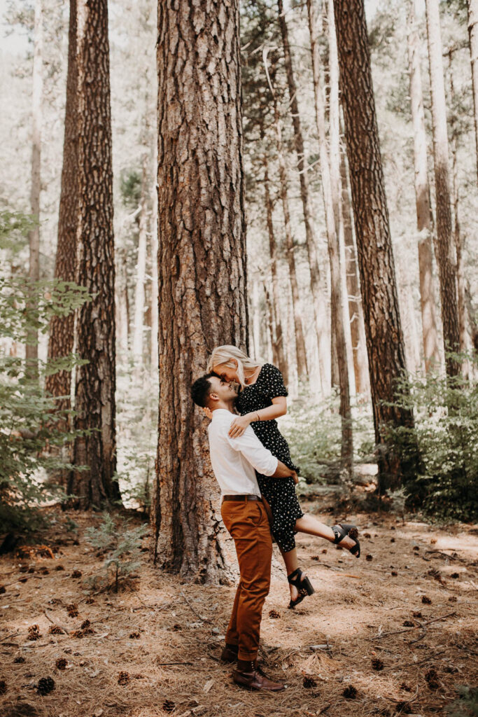 An engaged couple enjoys a romantic afternoon in the Redwoods